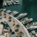 Boats in Dubai Marina beside the towers
