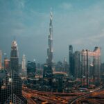 Burj Khalifa above the Dubai skyline at dusk