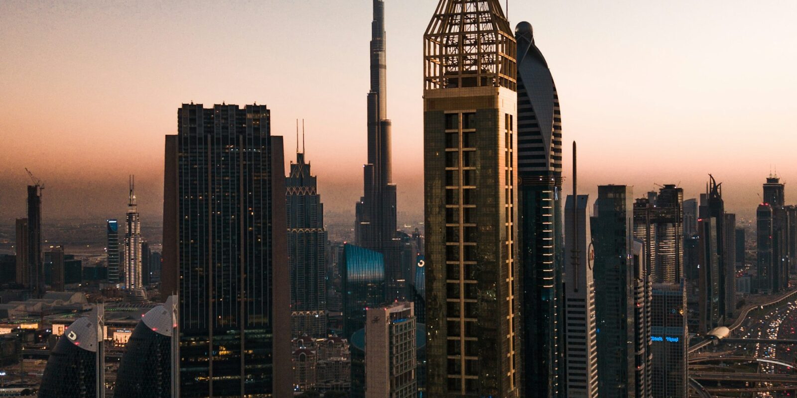 Dubai skyline under a blue sky