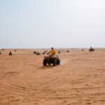 Quad bikes riding through the desert