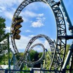 Roller coaster under a blue sky