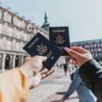 Travellers holding passports