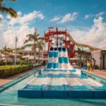 Water park with slides and palm trees