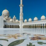 White domes and minaret of the Sheikh Zayed Grand Mosque
